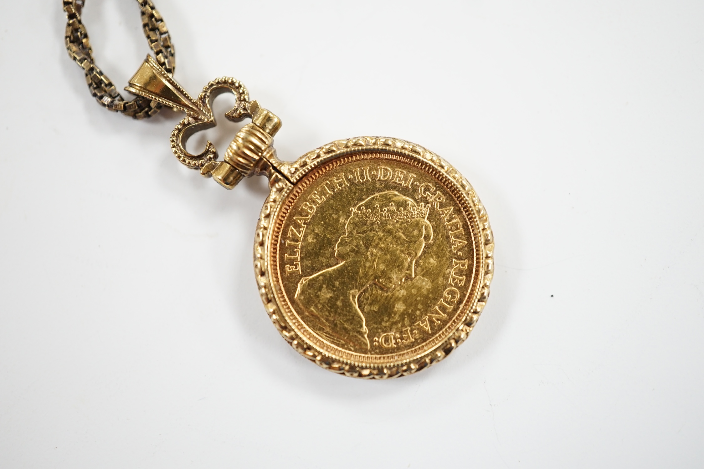 A 1982 gold half sovereign, in yellow metal pendant mount, on a 9ct gold chain, gross 16.4 grams.